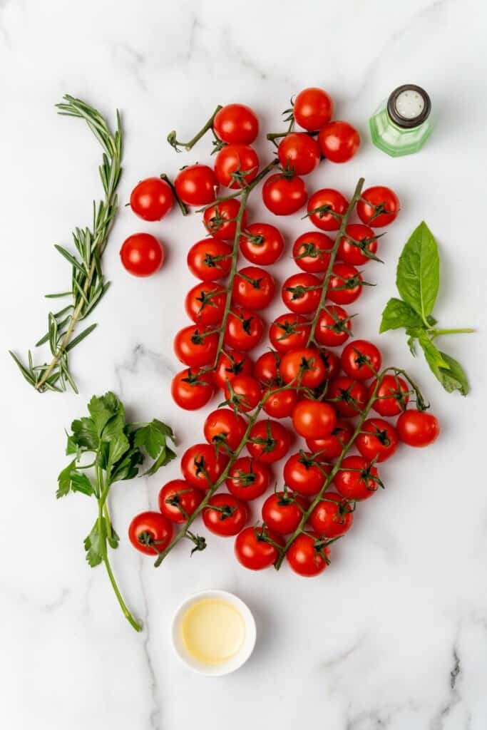 Ingredients needed to prepare cherry tomatoes in an air fryer.
