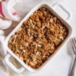 Baked Air Fryer Apple Crisp in a white rectangle pan.