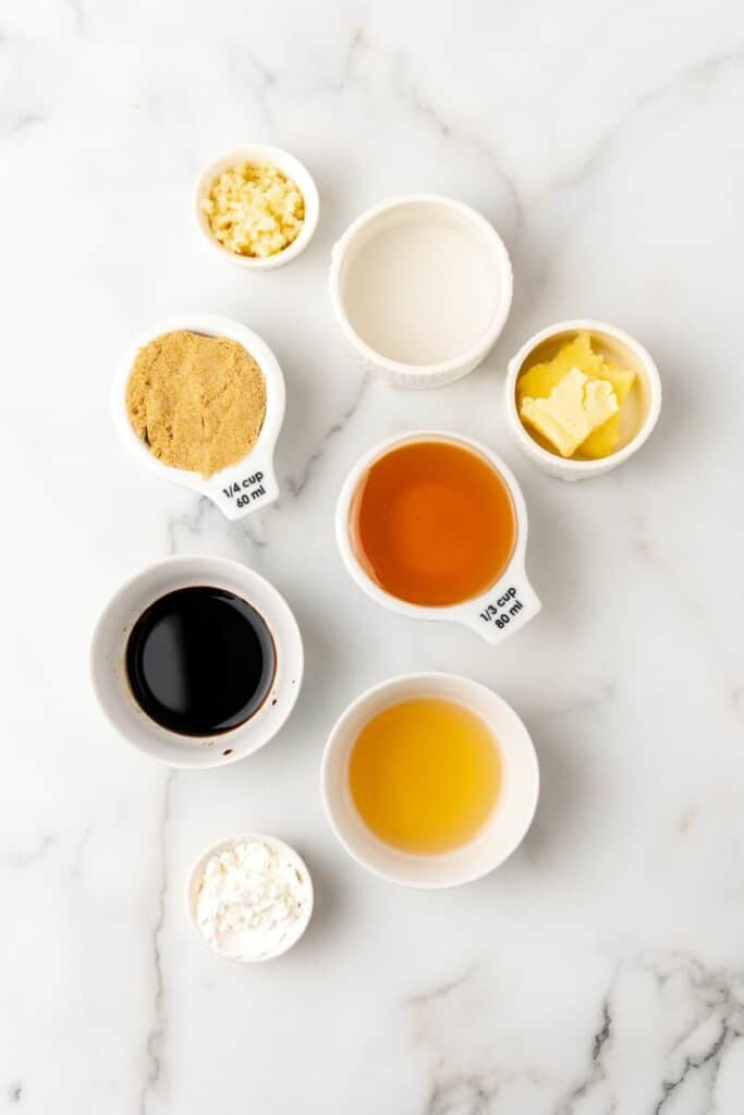 Overhead view of the ingredients needed to prepare honey garlic sauce.