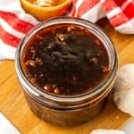 Honey Garlic Sauce in a clear small mason jar.