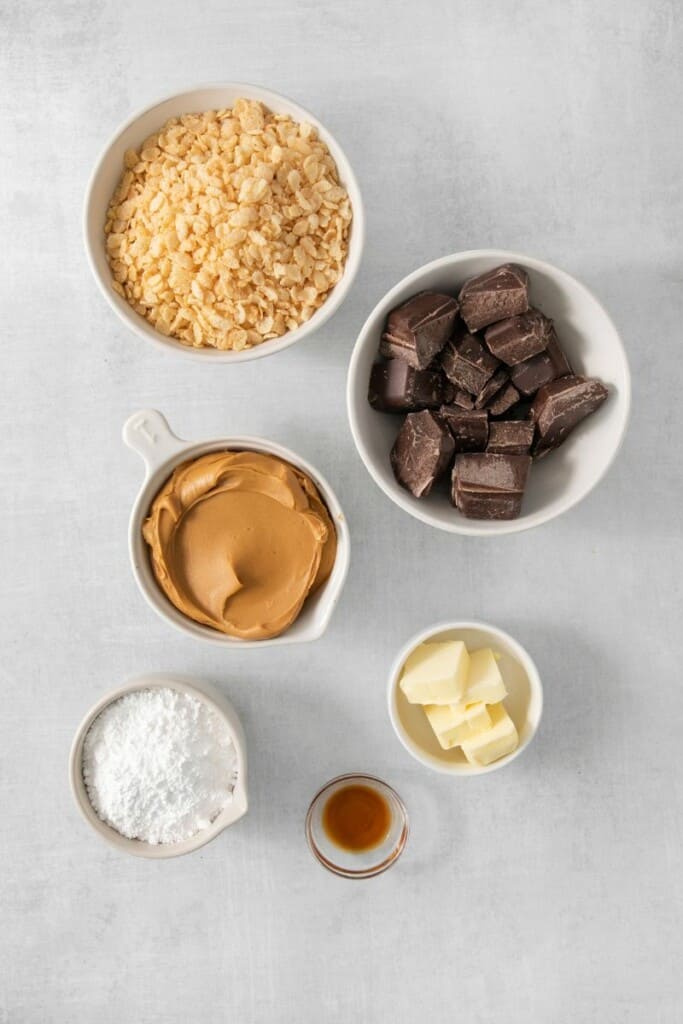 Overhead view of ingredients needed to prepare peanut butter balls with rice krispies.