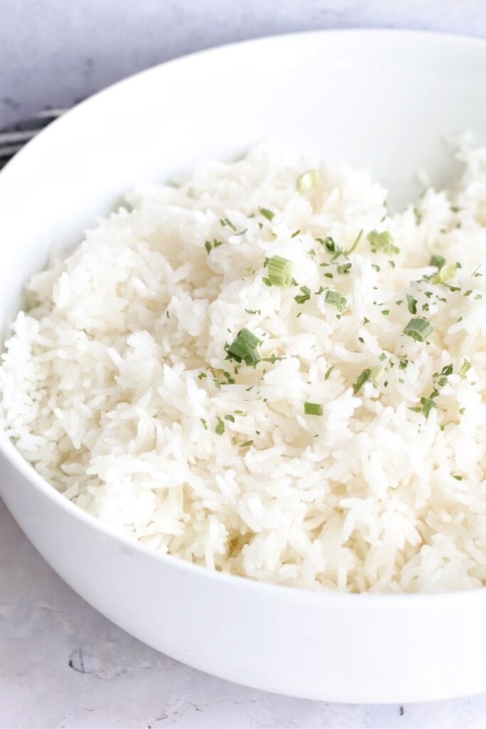 Closeup of ninja foodi white rice in a white bowl.