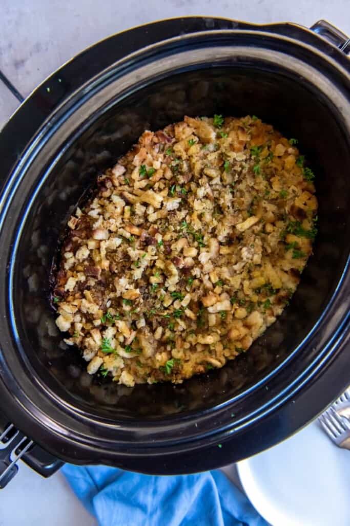 Chicken and Stuffing in a crock pot after cooking.