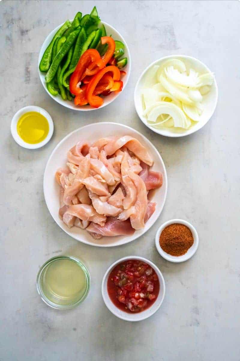 Ingredients needed to prepare chicken fajitas in the Instant Pot.