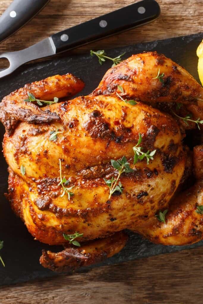 Closeup of cooked rotisserie chicken that was reheated in the air fryer