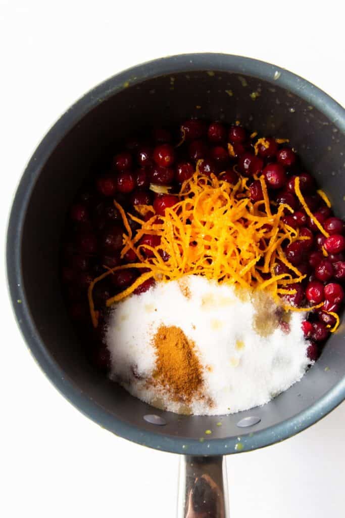 Ingredients about to be mixed in a pot to make my cranberry sauce recipe with orange.