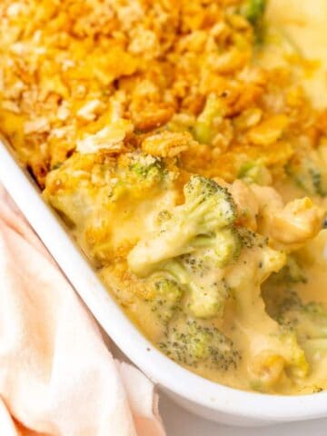 Close up view of prepared ritz broccoli casserole in a casserole dish.