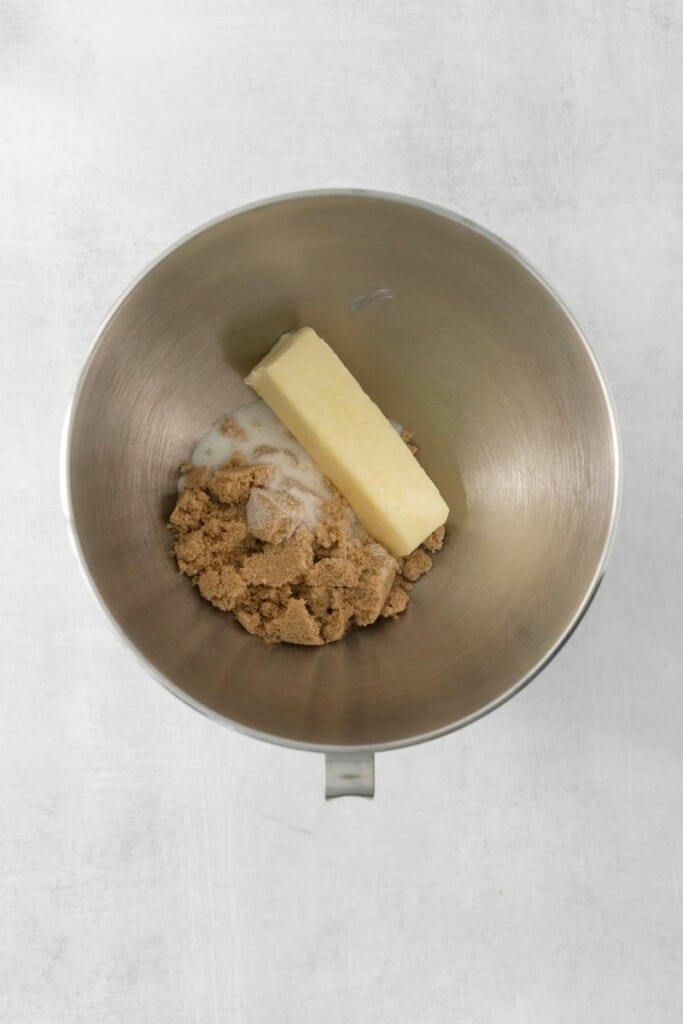 Butter and brown sugar in a mixing bowl.