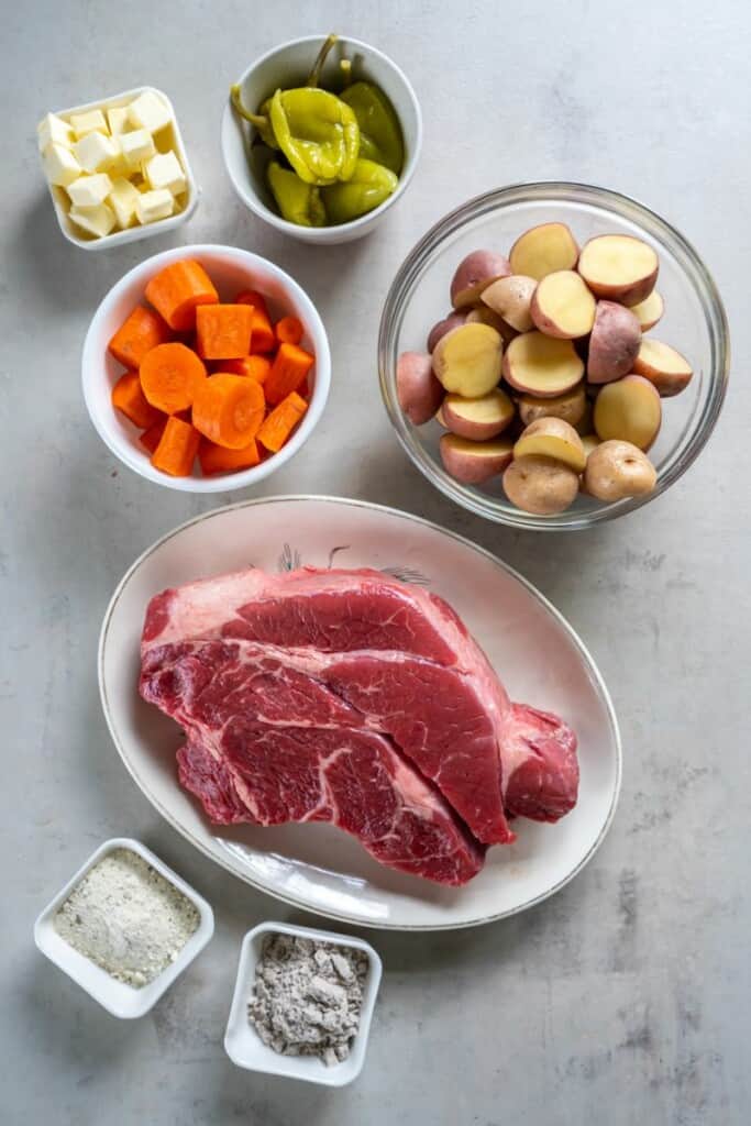 Ingredients needed to prepare a Mississippi Pot Roast and Vegetables.