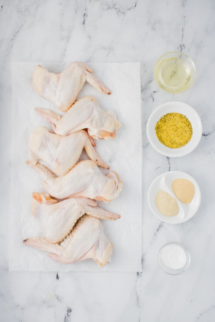 Ingredients needed to prepare whole chicken wings in the air fryer.