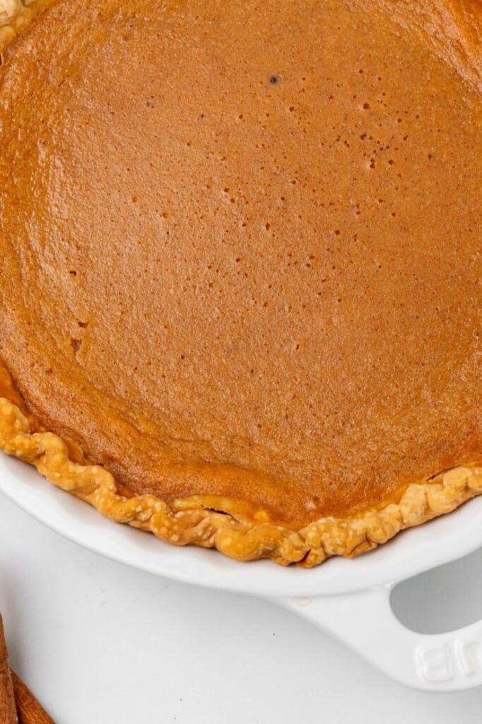 Close up view of a baked sweet potato pie.