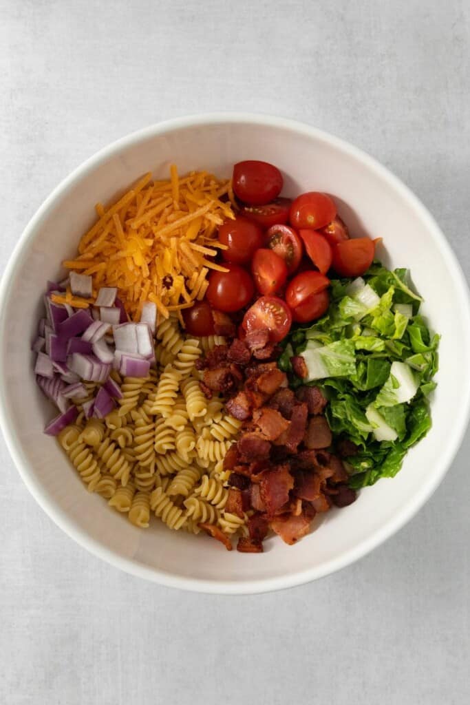 The primary ingredients needed for the base of a BLT Pasta Salad