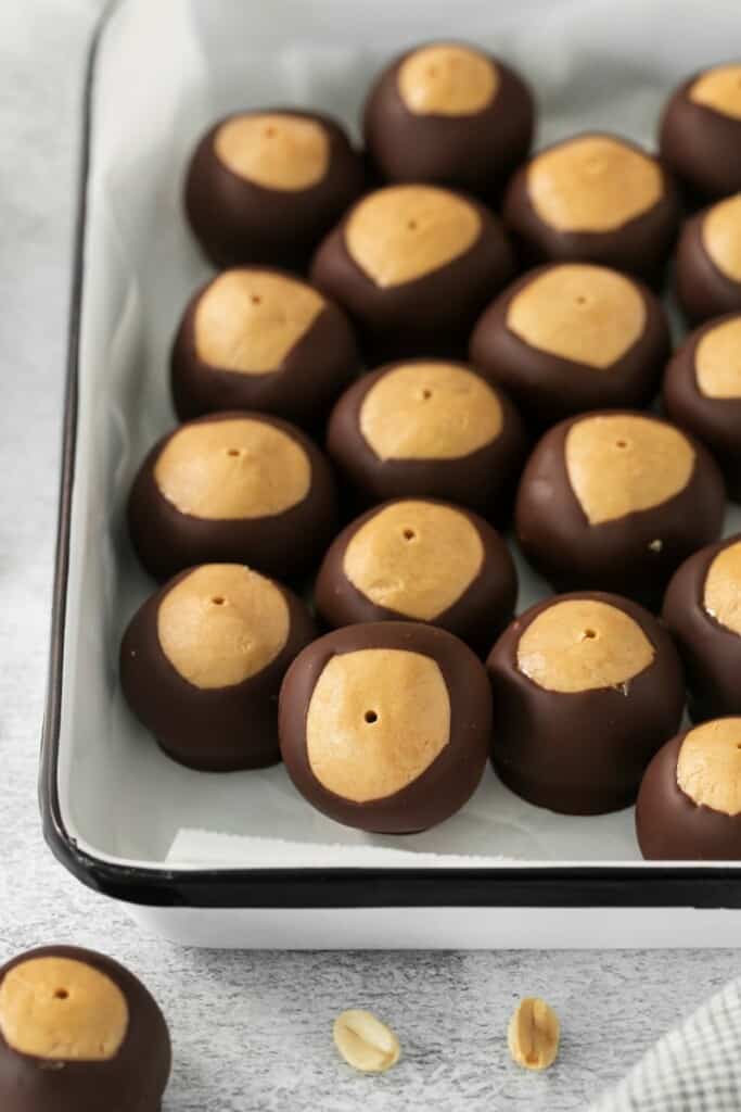 homemade peanut butter buckeyes on a pan 