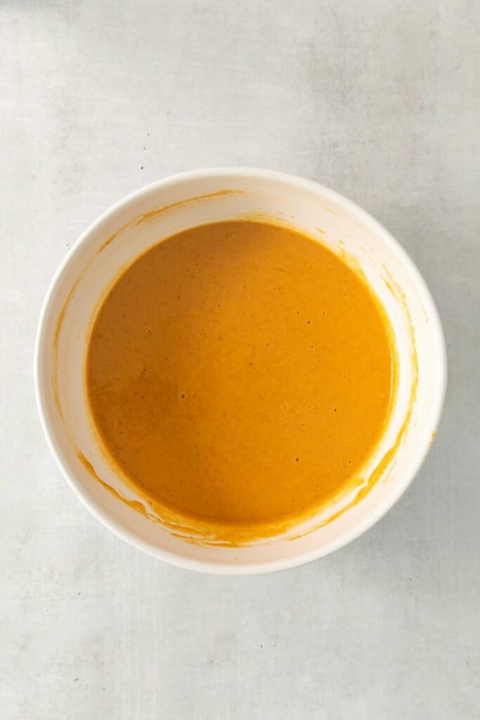 Sweet Potato Puree in a mixing bowl combined with remaining ingredients.