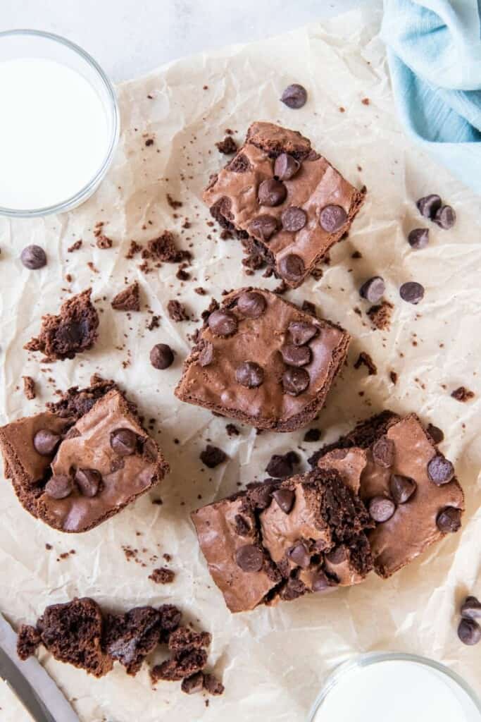 sliced brownies on parchment paper