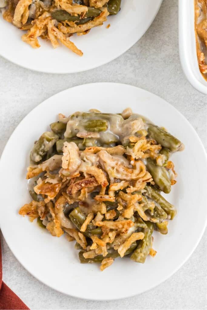 overhead shot of canned green bean casserole scooped onto a plate