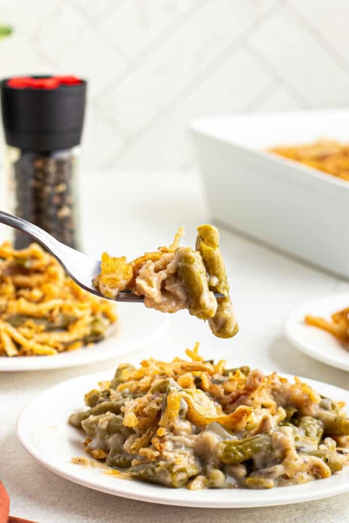 taking a bite out of frenchs green bean casserole with a fork