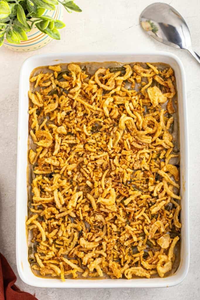 topping green bean casserole with fried onions