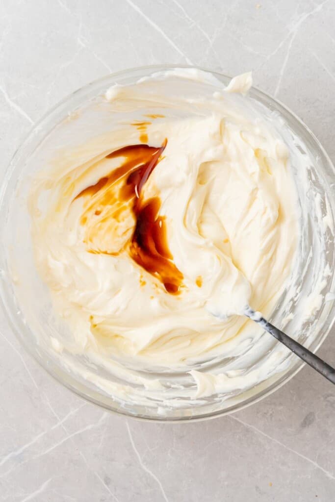 adding vanilla extract to yogurt mixture.
