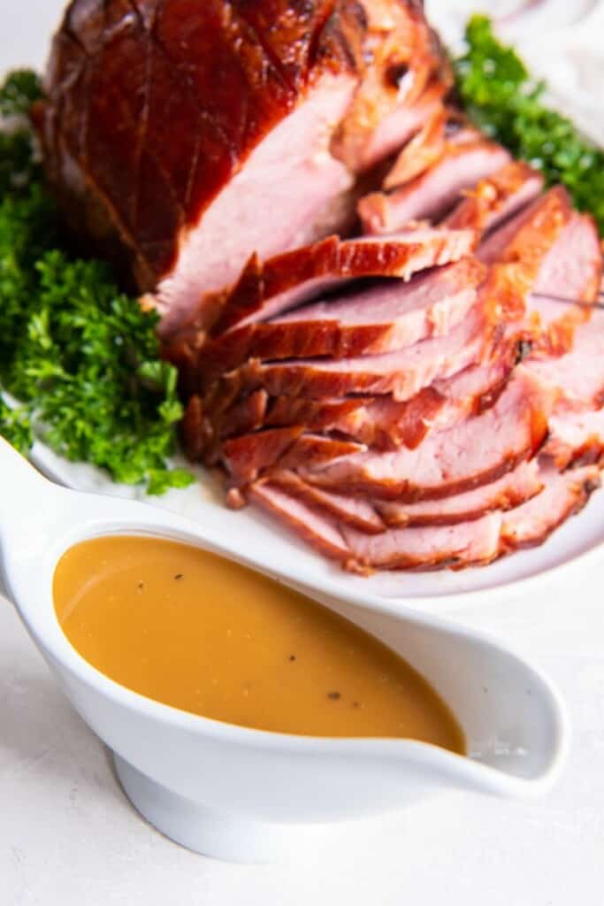 close up shot of homemade ham gravy in a bowl. 