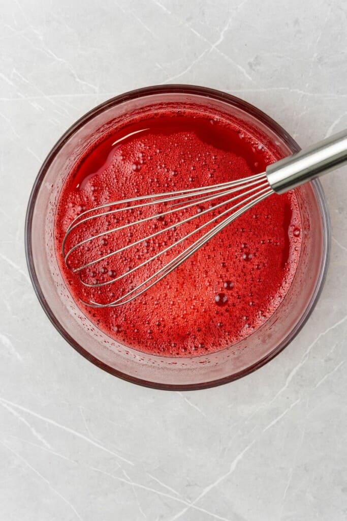 mixing together jello mixture