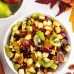 overhead shot of apple pomegranate fruit salad for the holidays.