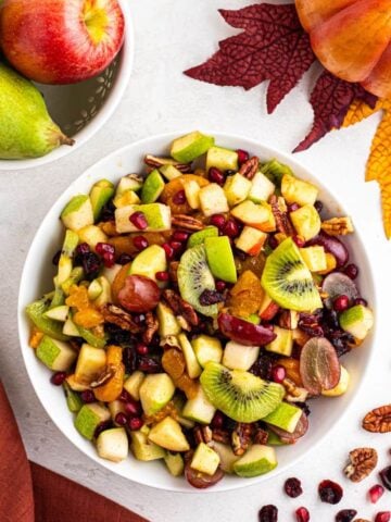 overhead shot of apple pomegranate fruit salad for the holidays.