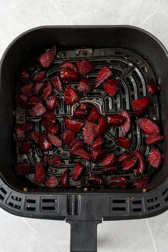 roasted beets in an air fryer basket 