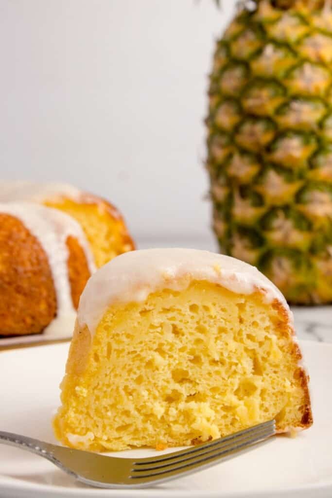 cream cheese pineapple pound cake on a plate 