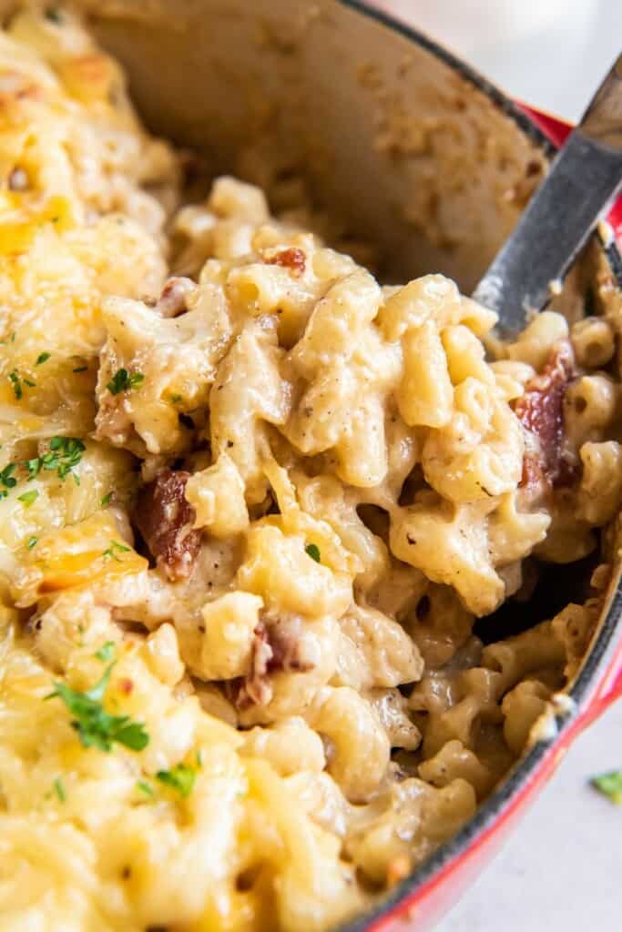 closeup of bacon mac and cheese in a pot 
