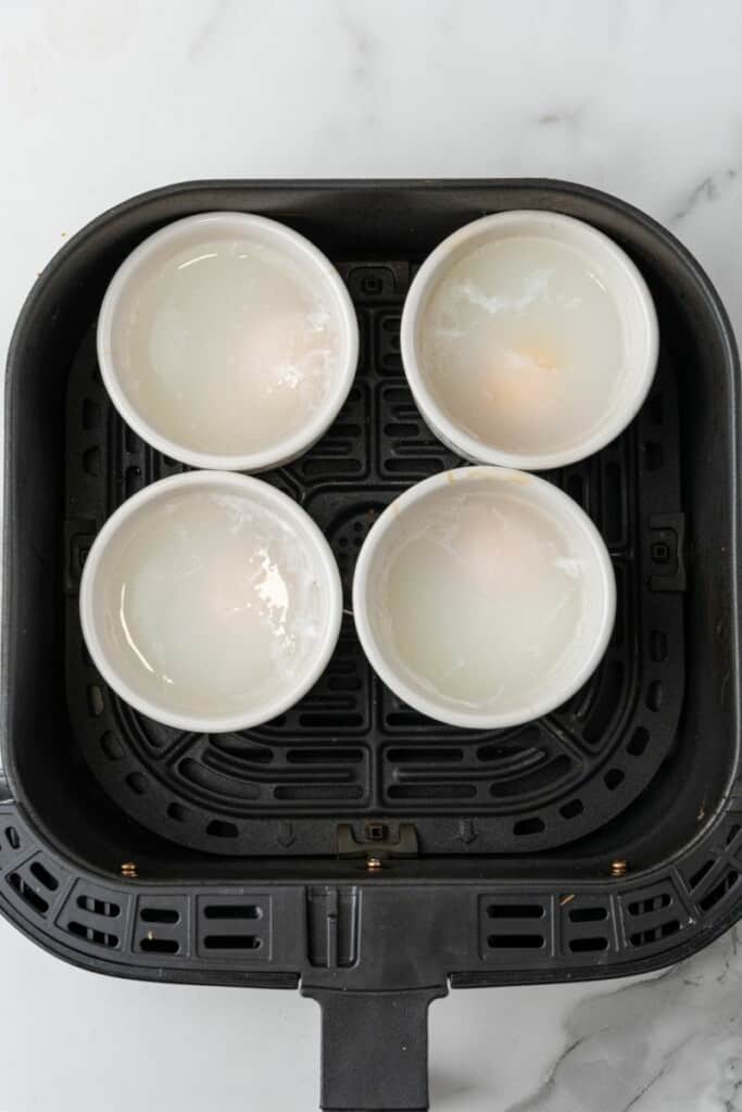 Air fryer poached eggs process photo.