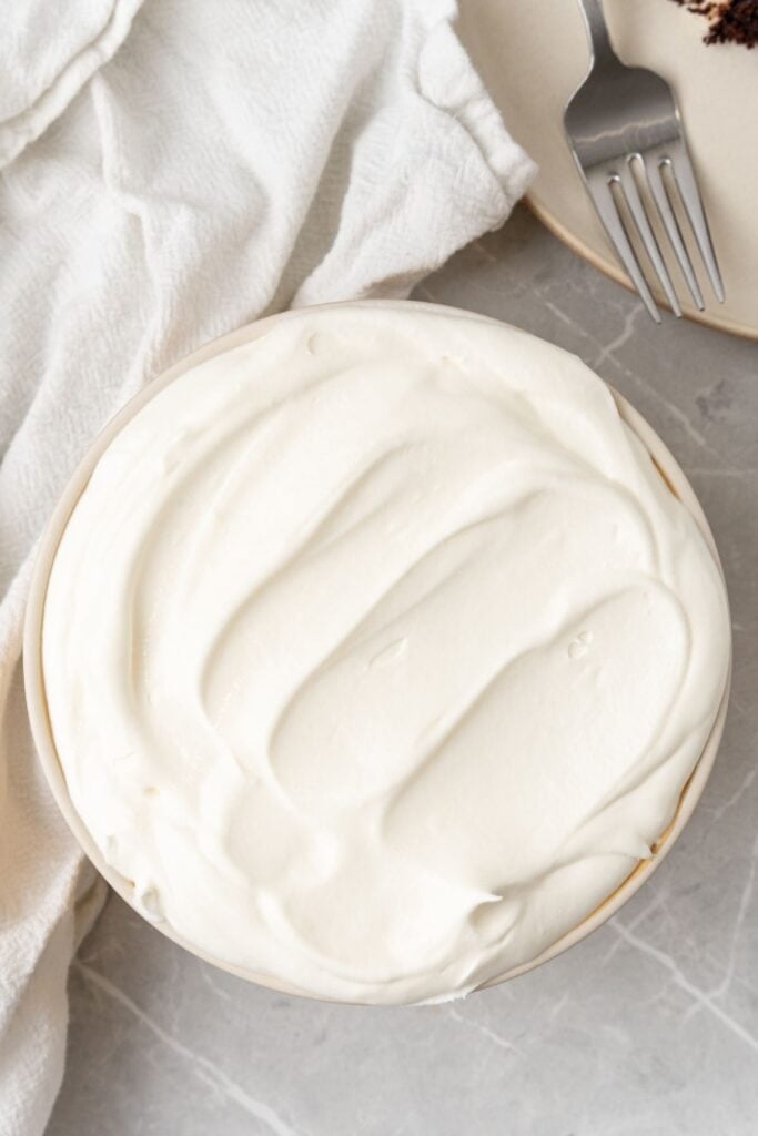 Overhead shot of the cool whip frosting recipe in a large bowl.