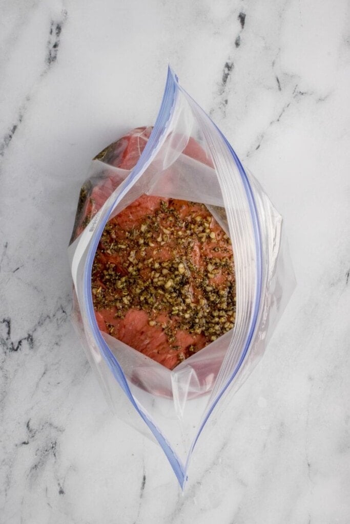 Marinating London broil in a food safe storage bag.