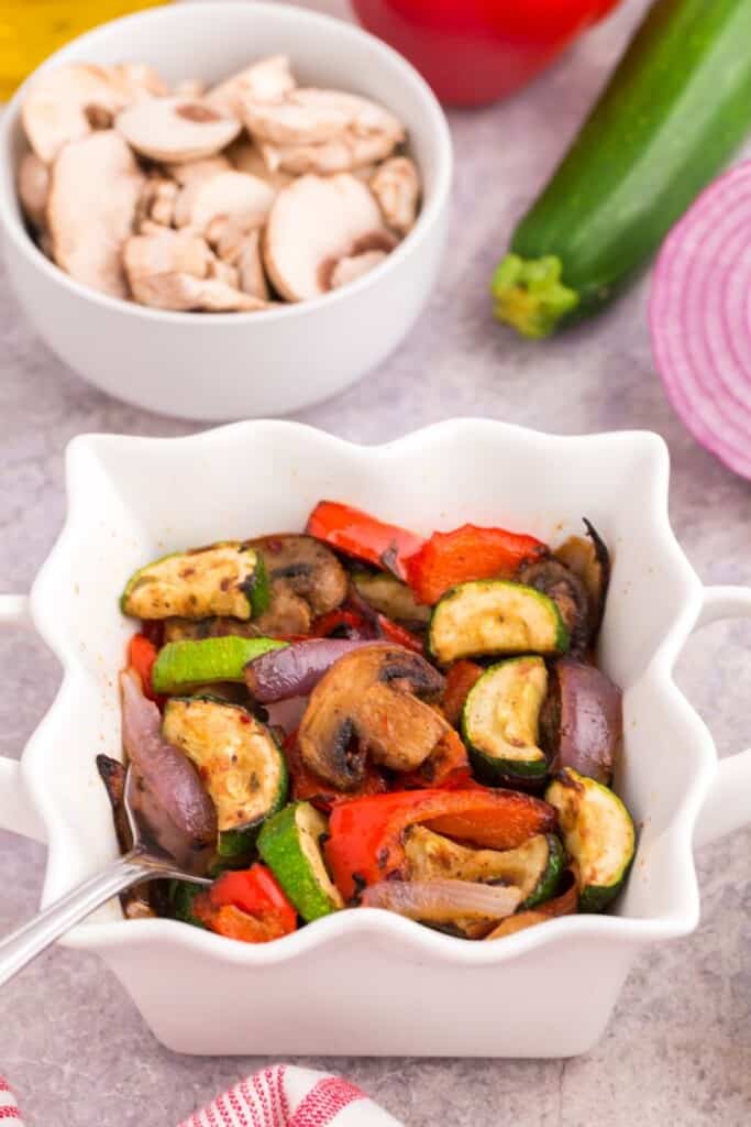 baking dish of healthy sliced veggies