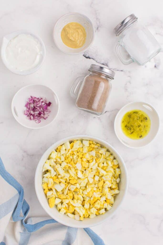 chopped up hard boiled eggs in a white bowl