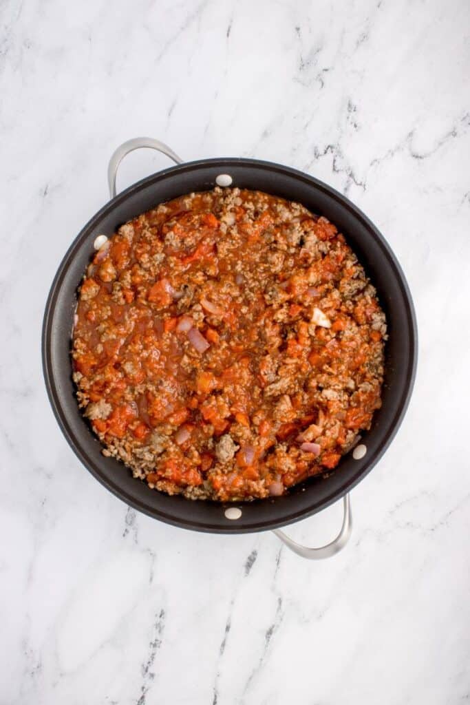 simmering meat sauce for lasagna.