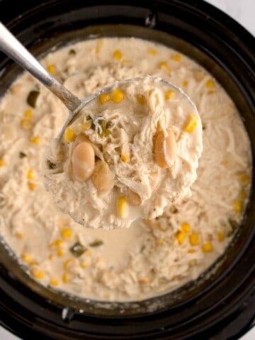 big scoop of crockpot white chicken chili