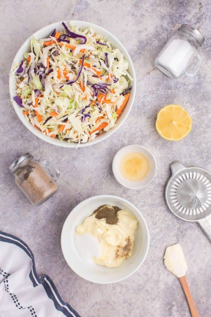 mixing together the ingredients needed to make the coleslaw dressing 