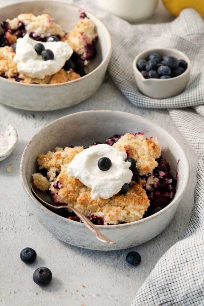 blueberry cobbler with whipped cream
