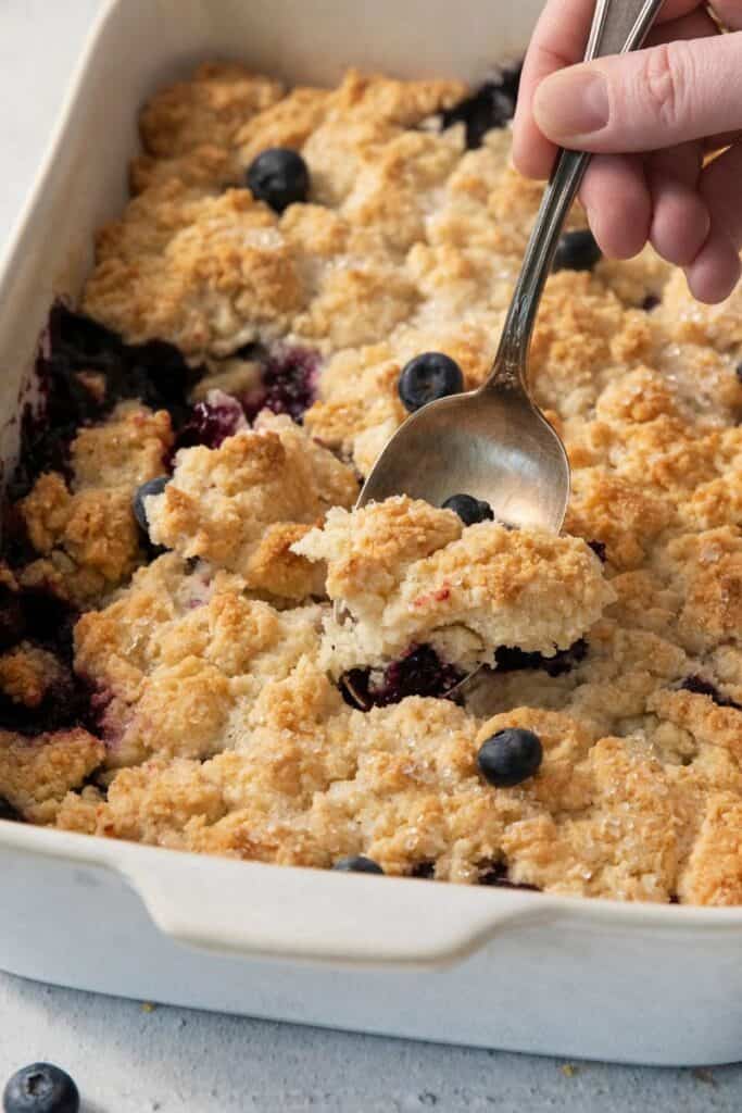 scooping up a piece of blueberry cobbler recipe