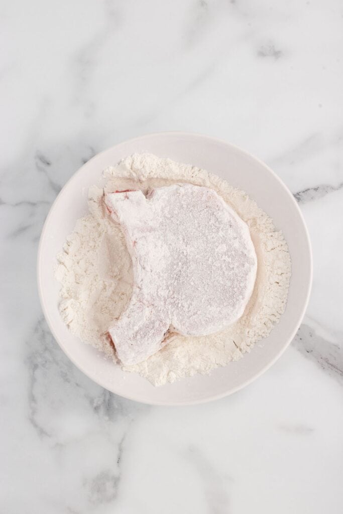 coating pork chops with flour