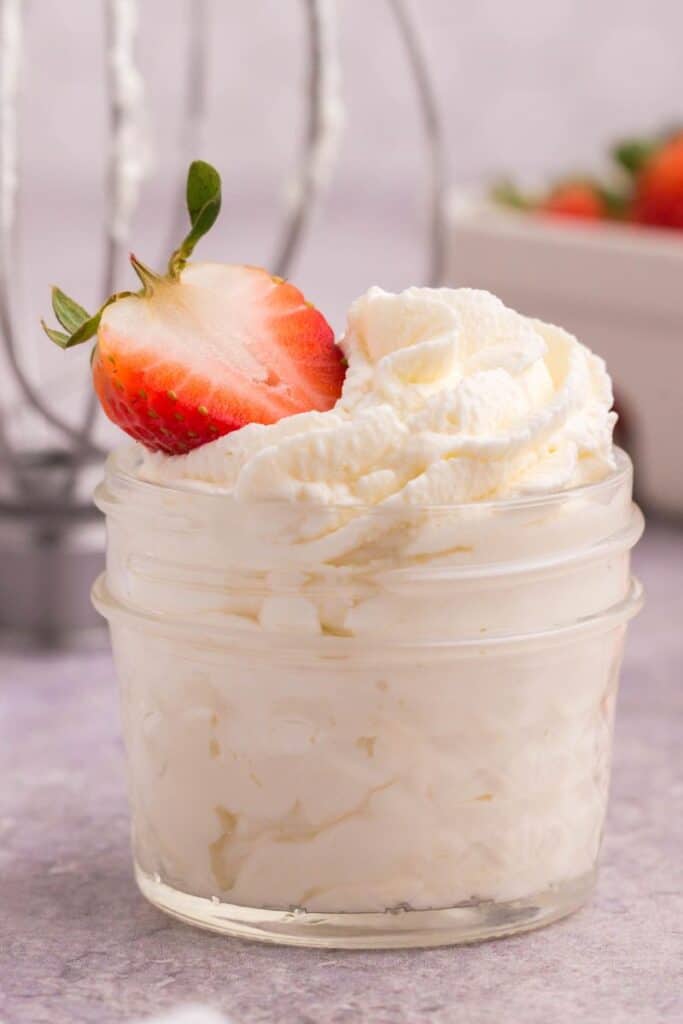 fresh homemade whipped cream in a small mason jar