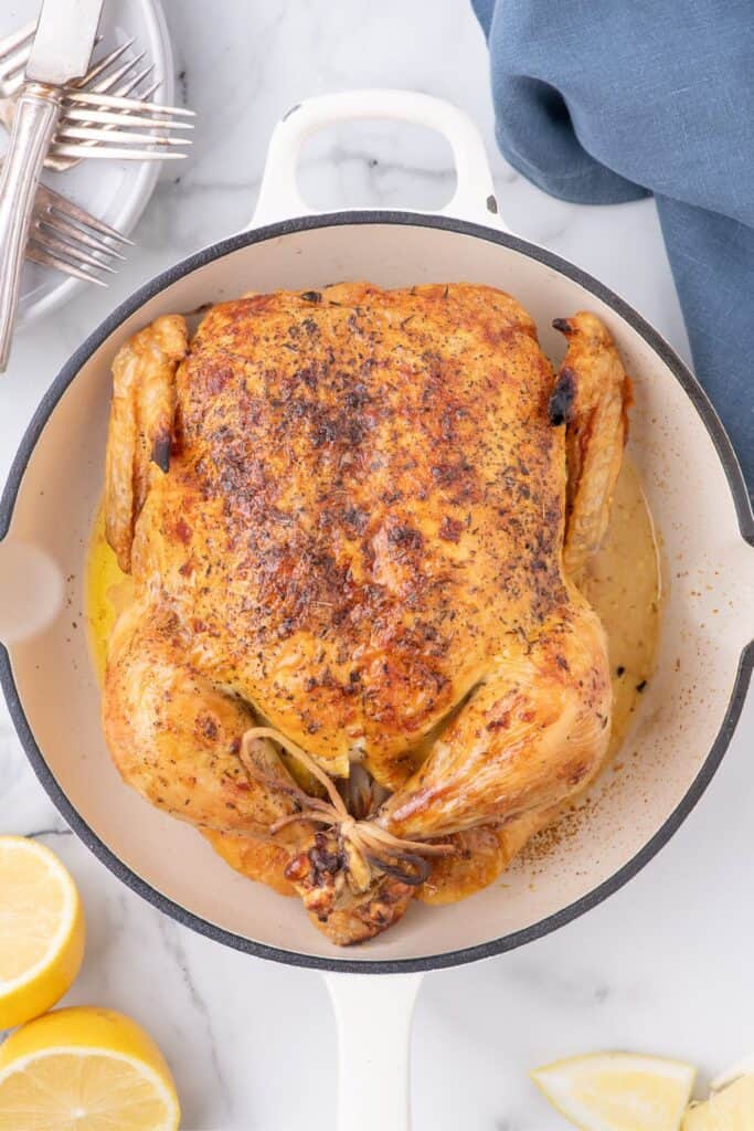roasting whole chicken until chicken skin is golden brown