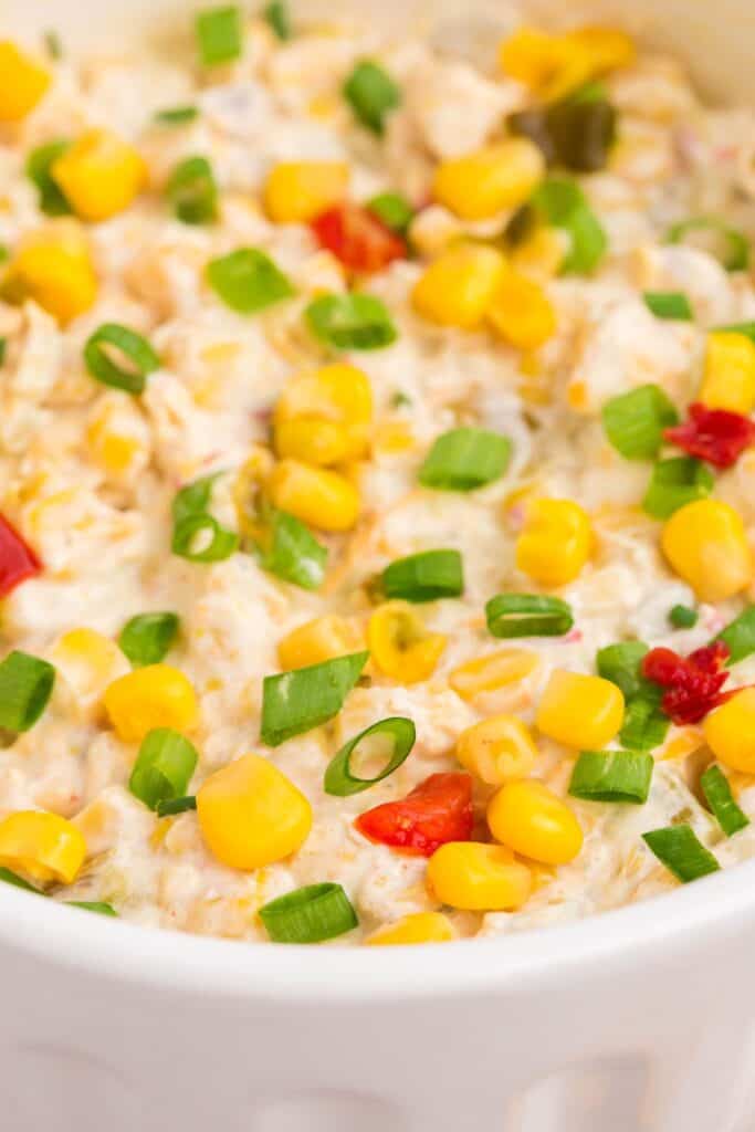 close up of easy corn dip with diced bell peppers