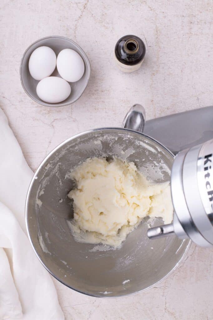 Creamed butter in a stand mixer.