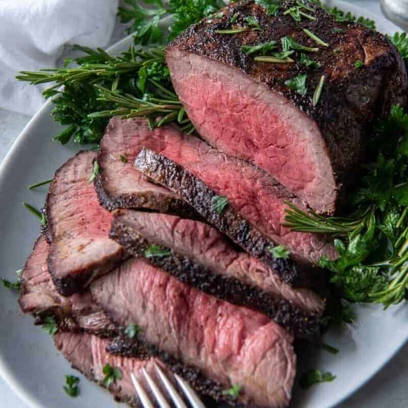Roast beef on a serving platter sliced