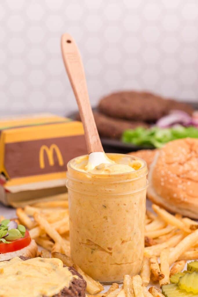 homemade big mac sauce on a glass jar with a spatula