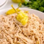 Mississippi chicken in a bowl with pepperoncini peppers