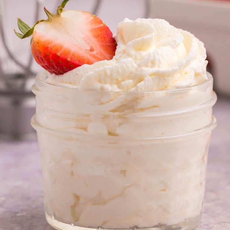 fresh homemade whipped cream in a small mason jar