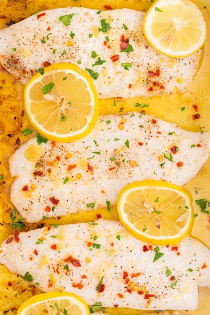 Baked tilapia in a 13x9 pan.